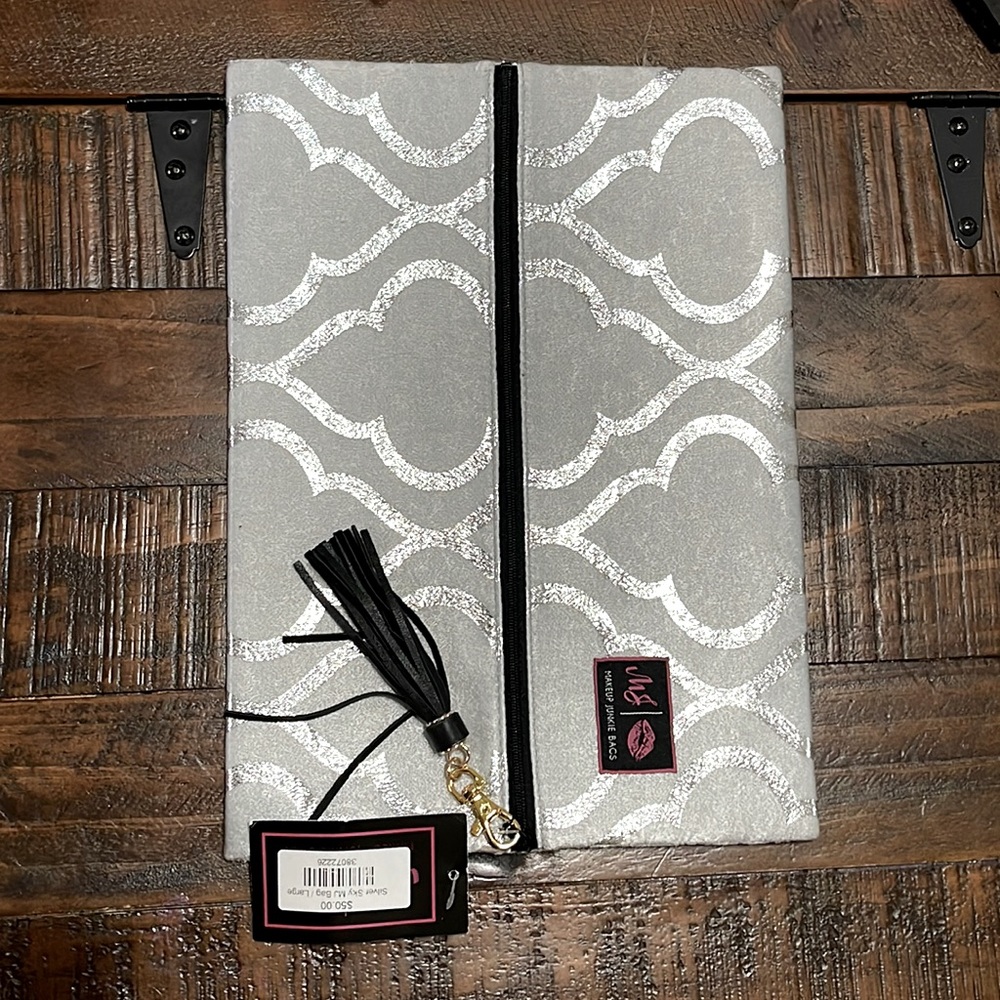 Brand new make up junkie bag